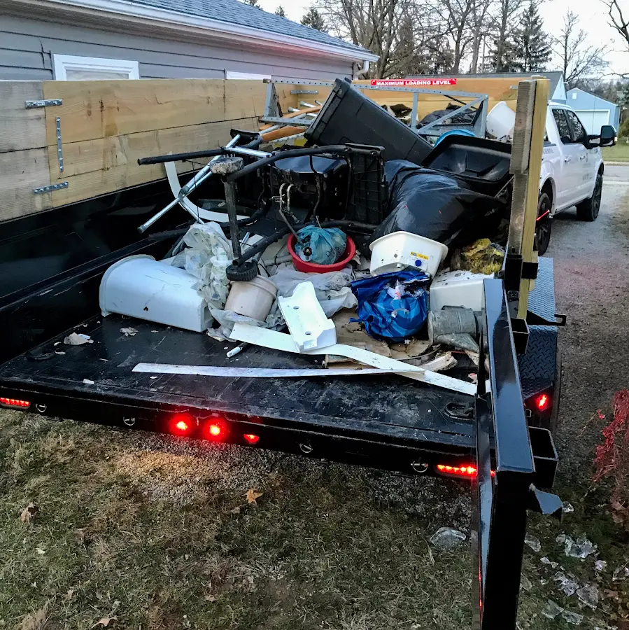 Roll-off dumpster delivered to a residential driveway in Langley Park